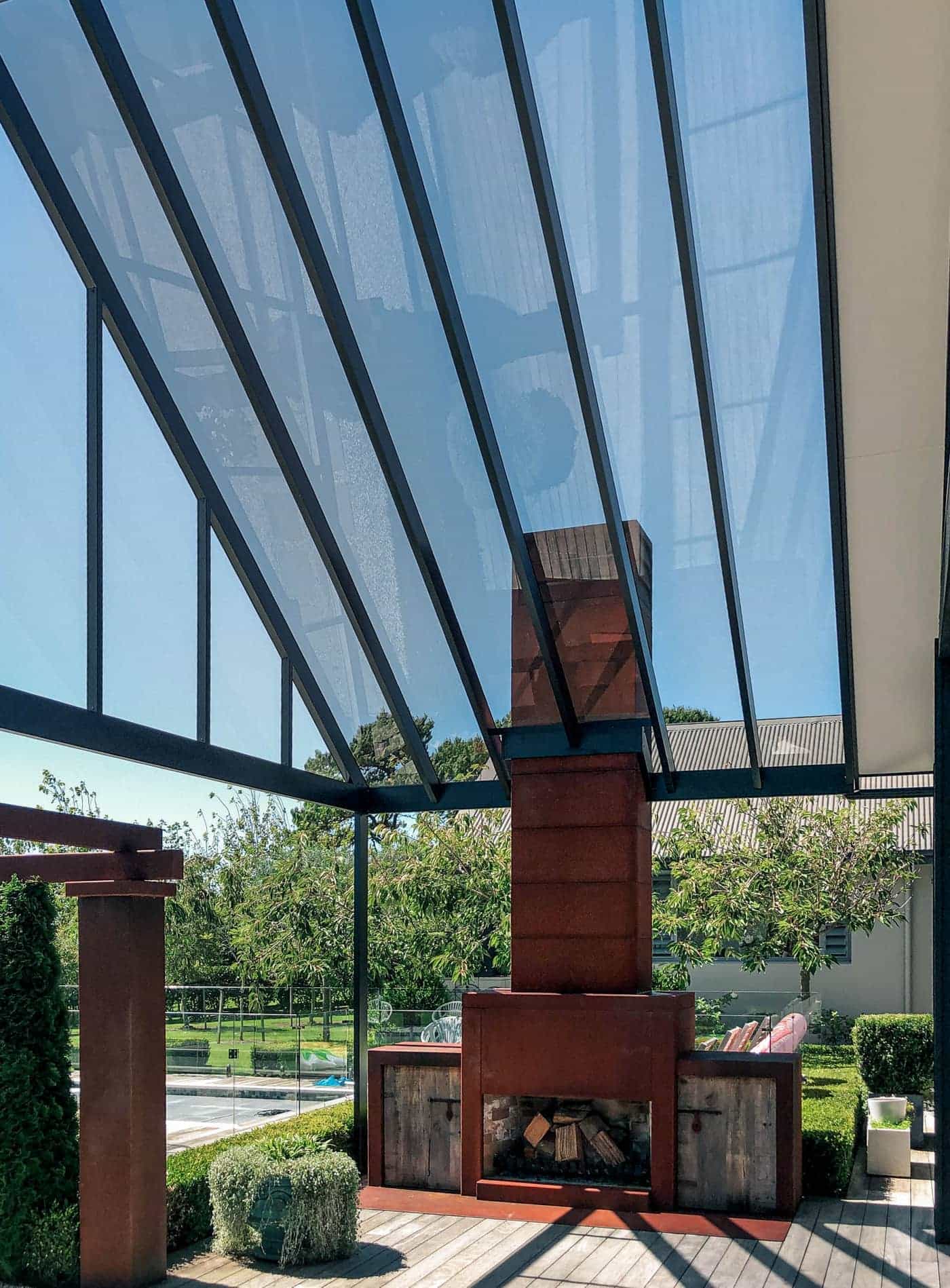 Acrylic roof over an outdoor dining area