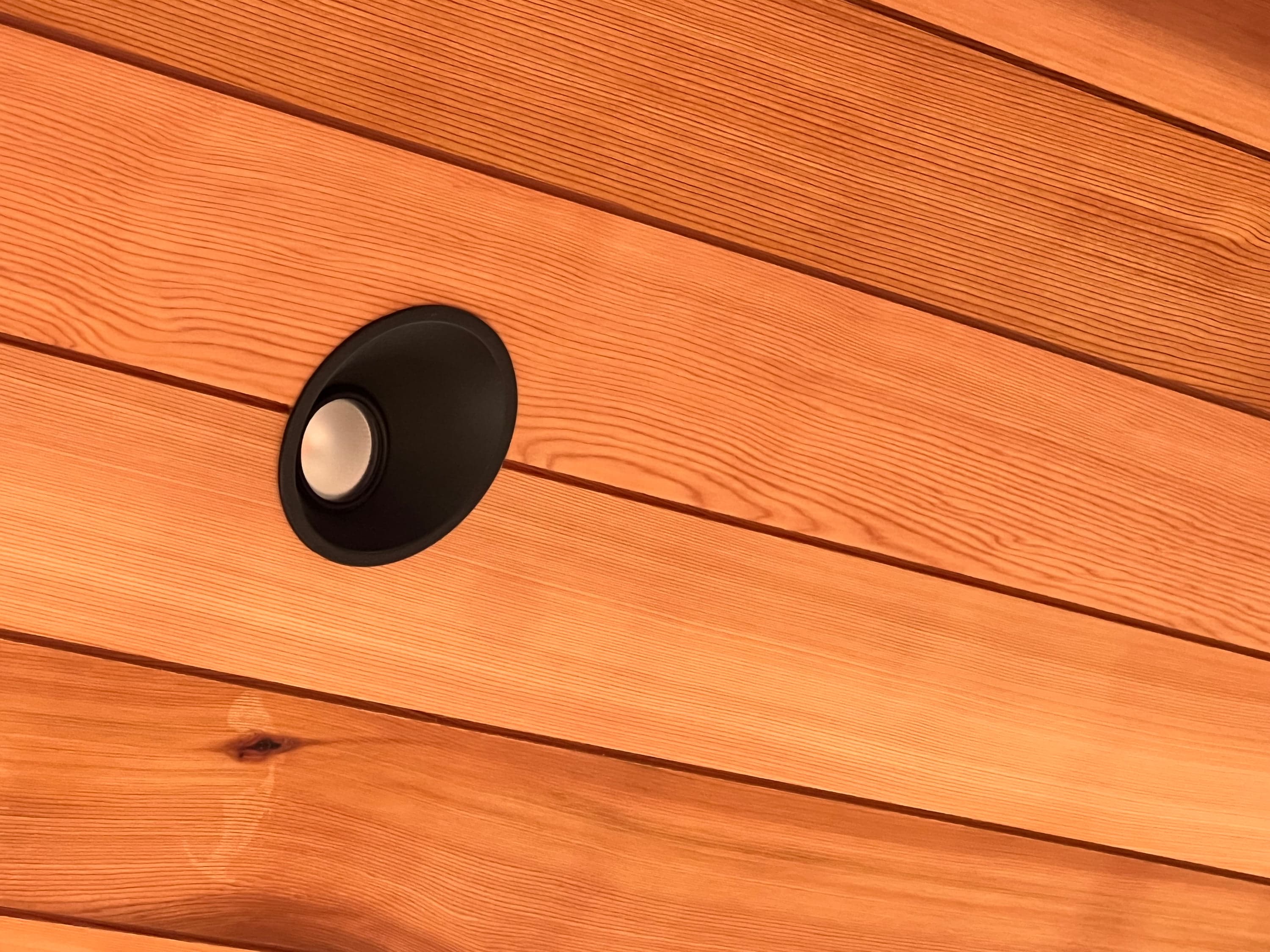 Recessed downlight set into a pergola ceiling detail