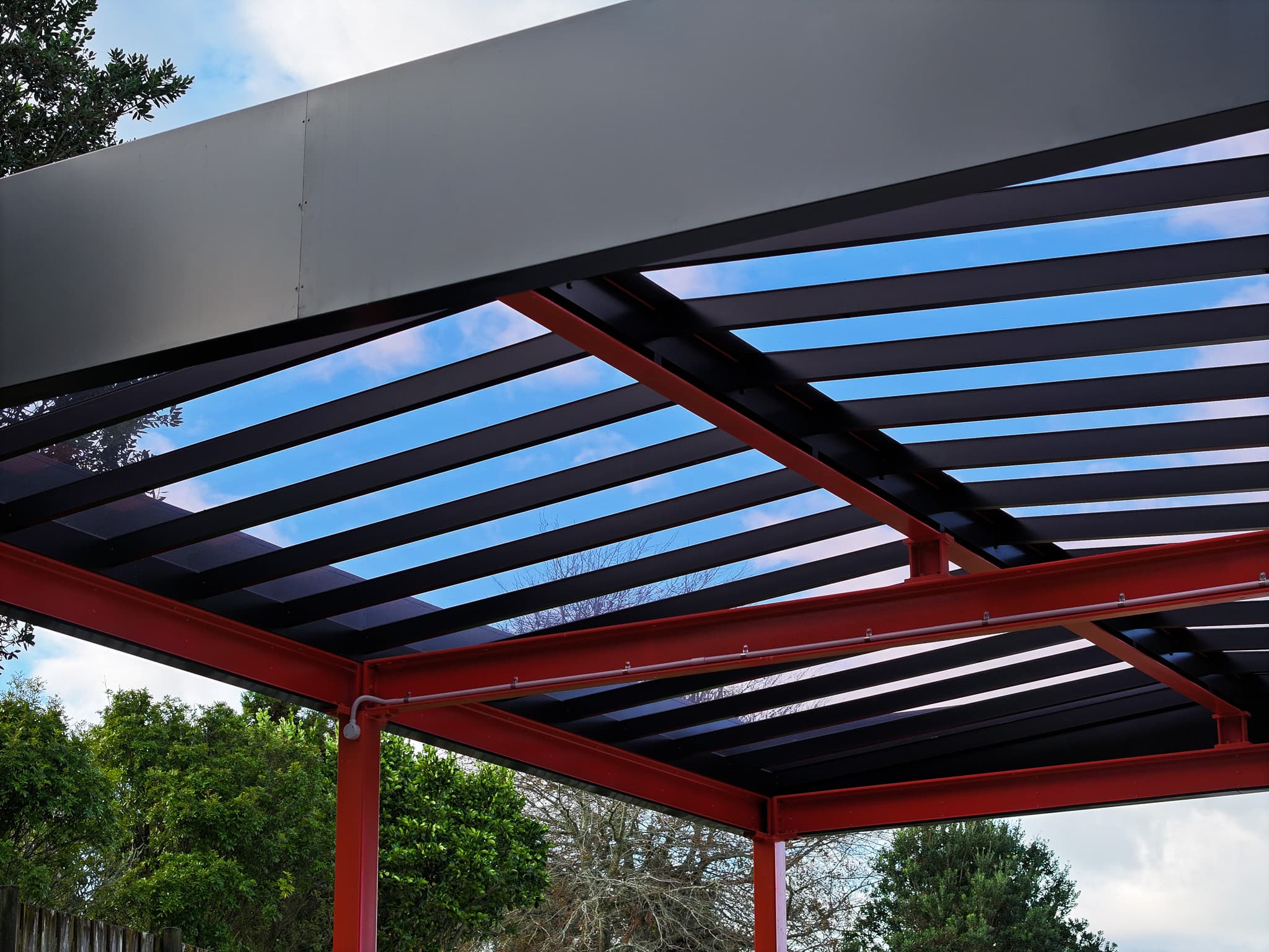 Detailed aluminium rafters and custom pergola framing in Auckland
