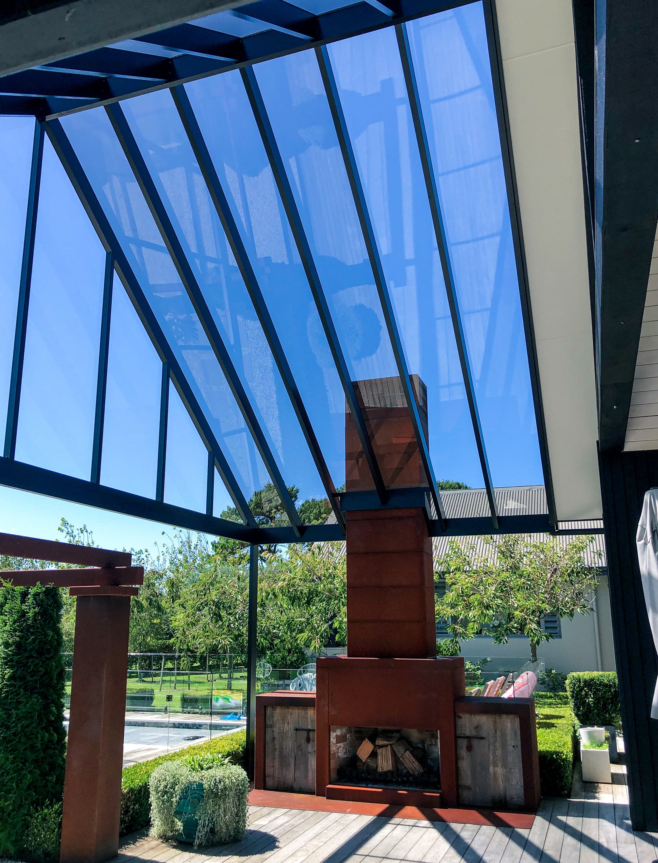 Acrylic roof over an outdoor dining area