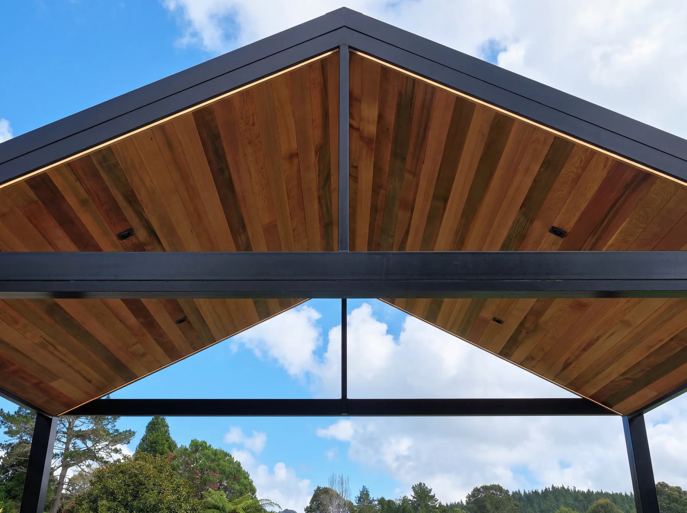 Timber sarking, downlights and LED strip lighting inside the Riverhead gable pavilion