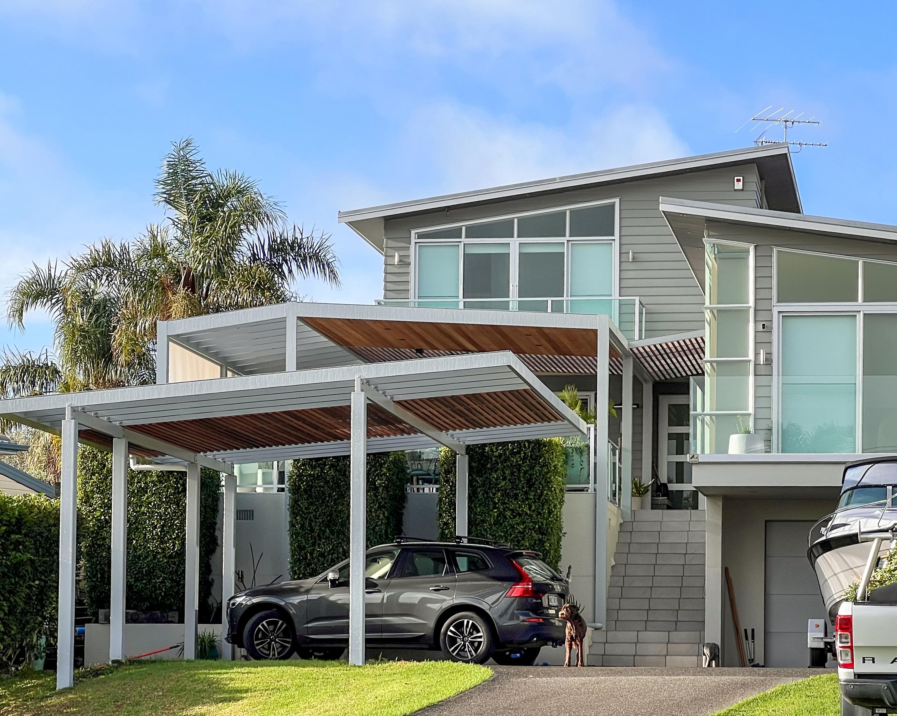Tindalls Bay home with connected patio and carport roof structures