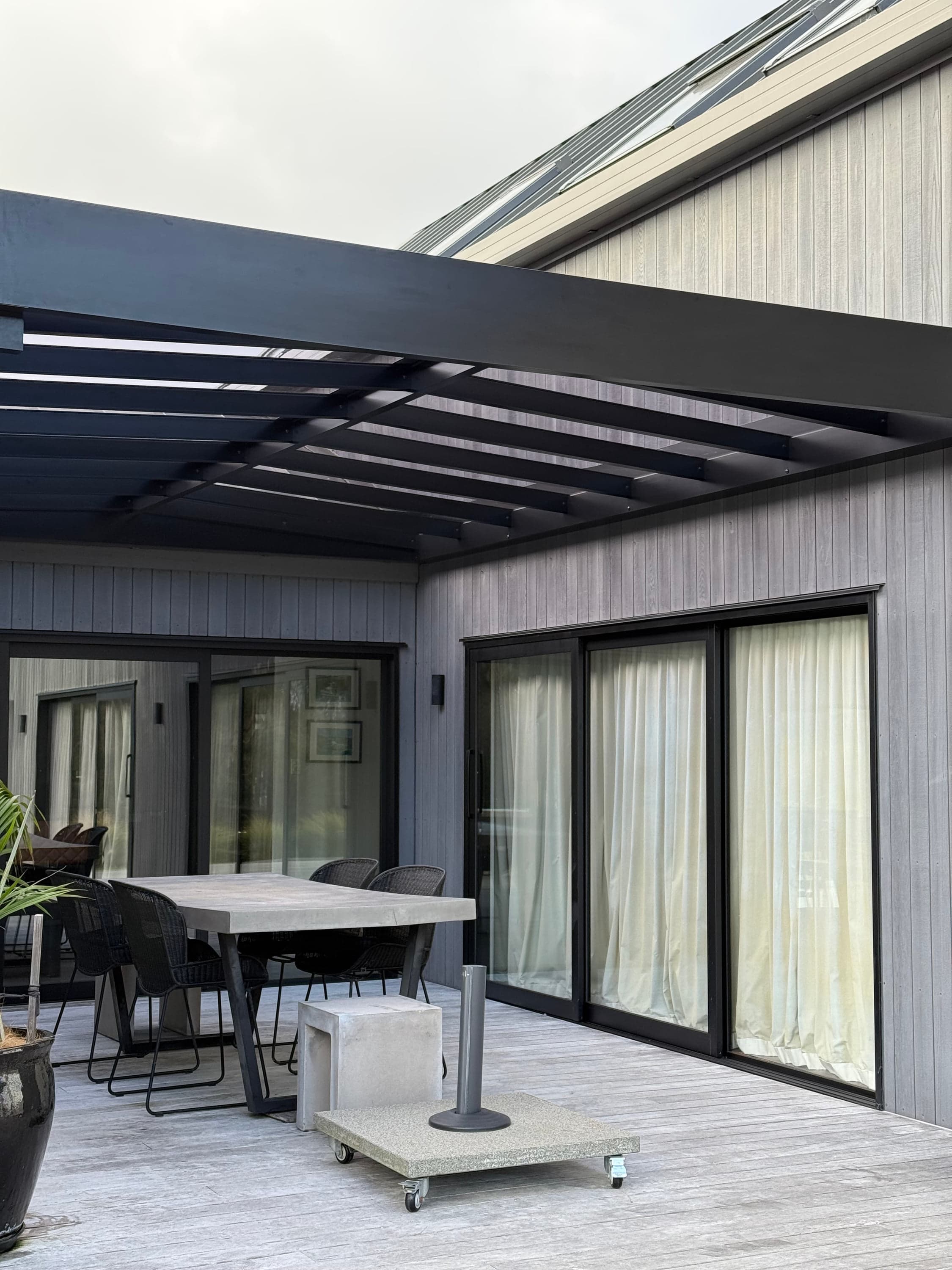 Custom pergola structure showing roof, frame and site-specific scope